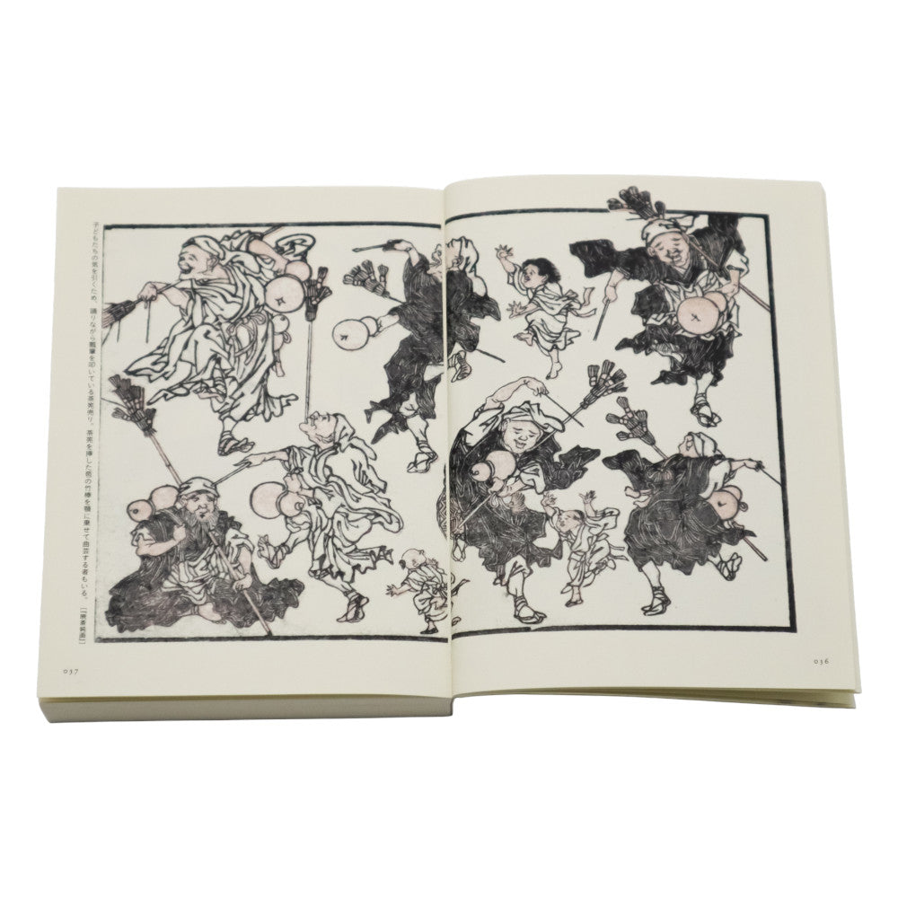 Open book with black and white illustrations of characters on a white background
