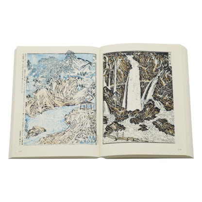 Open book displaying illustrations of landscapes on a white background